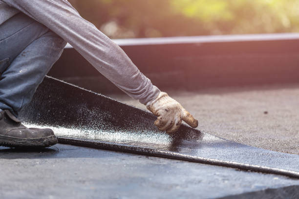 Professional Basement Waterproofing technician working in Bessemer, MI